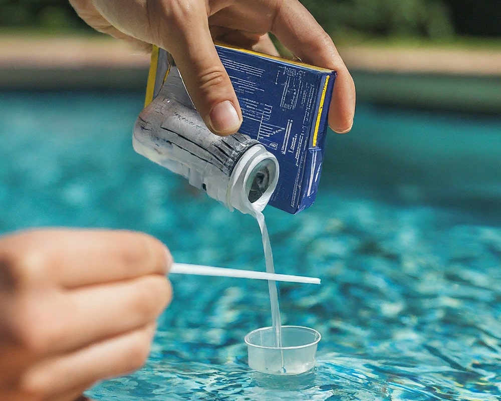 Balancing pool water with test kit of chemicals